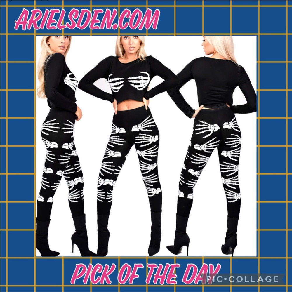 Black outfit with white skull handprints on it